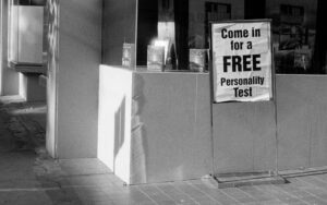 Sign outside a business saying "Come in for a free personality test"
